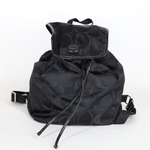 Coach Handbags - Coach Black Signature Nylon Turnlock Tie Rucksack Backpack